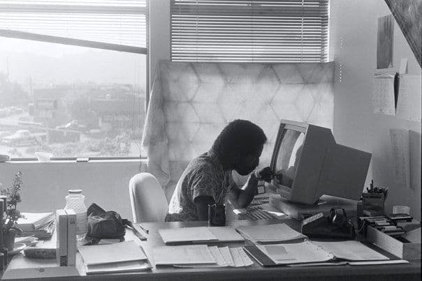 John Henry Thompson at his Lucasfilm office, mid-1980s. Two SUN workstations on the desk.
